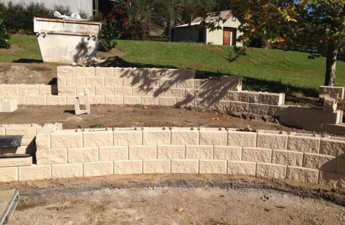 Retaining & Retention Walls-Irving TX Landscape Designs & Outdoor Living Areas-We offer Landscape Design, Outdoor Patios & Pergolas, Outdoor Living Spaces, Stonescapes, Residential & Commercial Landscaping, Irrigation Installation & Repairs, Drainage Systems, Landscape Lighting, Outdoor Living Spaces, Tree Service, Lawn Service, and more.